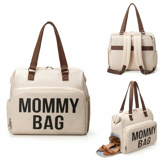 Beige 'Mommy Bag' with brown handles on a white background