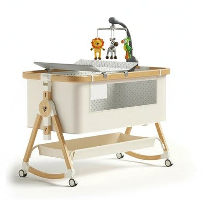 Baby crib with wooden frame and white mattress on a white background